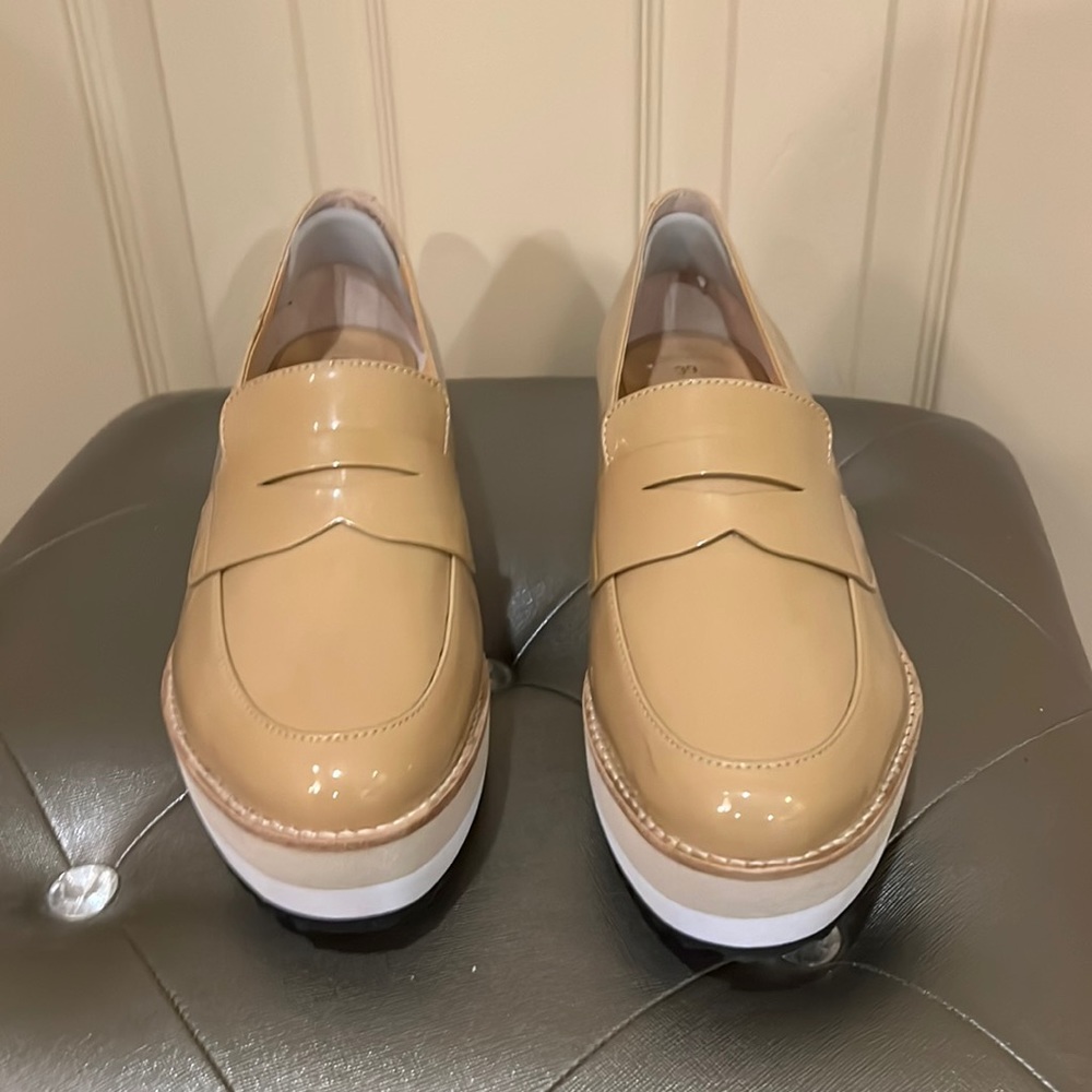 New and never worn, trendy and comfortable patent leather platform loafers